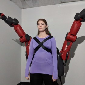Picture of acting with wearable robotic arms